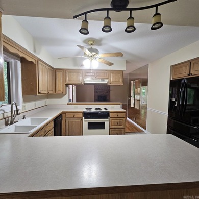 Golf Course Charm Meets Thoughtful Comfort - Ponce de Leon on Ponce De Leon Golf Course in Arkansas - for sale on GolfHomes.com, golf home, golf lot