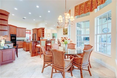 Luxury lakeside living awaits in this 5-bedroom, 3 full and 2 on Willoughby Golf Club in Florida - for sale on GolfHomes.com, golf home, golf lot