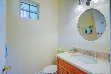 Luxury lakeside living awaits in this 5-bedroom, 3 full and 2 on Willoughby Golf Club in Florida - for sale on GolfHomes.com, golf home, golf lot