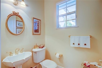 Luxury lakeside living awaits in this 5-bedroom, 3 full and 2 on Willoughby Golf Club in Florida - for sale on GolfHomes.com, golf home, golf lot