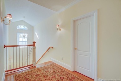 Luxury lakeside living awaits in this 5-bedroom, 3 full and 2 on Willoughby Golf Club in Florida - for sale on GolfHomes.com, golf home, golf lot