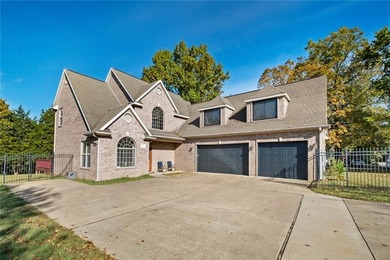 Discover the perfect mix of comfort, space, and country charm in on Fayetteville Country Club in Arkansas - for sale on GolfHomes.com, golf home, golf lot