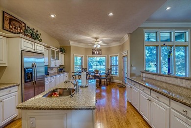 Discover sophistication and comfort in this striking home on Harrison Country Club in Arkansas - for sale on GolfHomes.com, golf home, golf lot