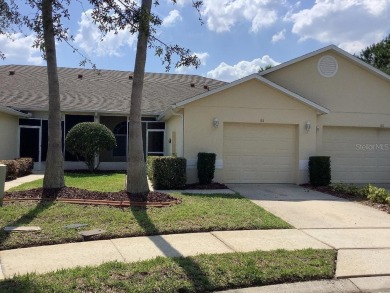 Charming two-bedroom, two-bath residence with a flex room on Remington Golf Club in Florida - for sale on GolfHomes.com, golf home, golf lot