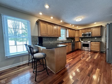 Welcome home to this beautifully maintained two-story residence on  in Indiana - for sale on GolfHomes.com, golf home, golf lot