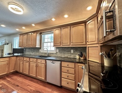 Welcome home to this beautifully maintained two-story residence on  in Indiana - for sale on GolfHomes.com, golf home, golf lot