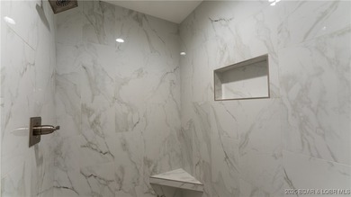 New construction located on fairway #3 of the prestigious Club on The Club At Porto Cima in Missouri - for sale on GolfHomes.com, golf home, golf lot