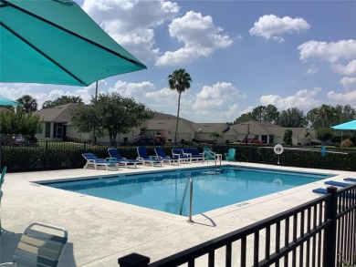 Charming two-bedroom, two-bath residence with a flex room on Remington Golf Club in Florida - for sale on GolfHomes.com, golf home, golf lot