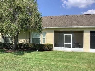 Charming two-bedroom, two-bath residence with a flex room on Remington Golf Club in Florida - for sale on GolfHomes.com, golf home, golf lot