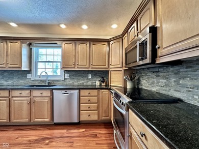 Welcome home to this beautifully maintained two-story residence on  in Indiana - for sale on GolfHomes.com, golf home, golf lot