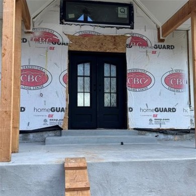 This newly constructed soon to be masterpiece was crafted with on The Coves Golf Course in Oklahoma - for sale on GolfHomes.com, golf home, golf lot