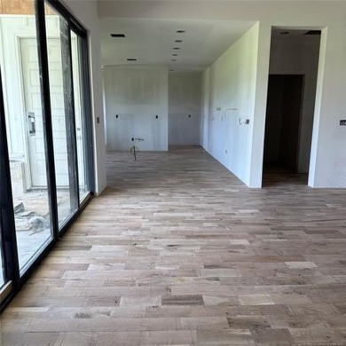 This newly constructed soon to be masterpiece was crafted with on The Coves Golf Course in Oklahoma - for sale on GolfHomes.com, golf home, golf lot