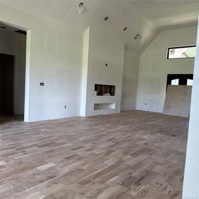 This newly constructed soon to be masterpiece was crafted with on The Coves Golf Course in Oklahoma - for sale on GolfHomes.com, golf home, golf lot