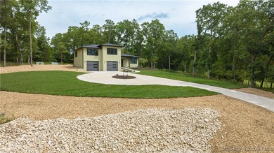 New construction located on fairway #3 of the prestigious Club on The Club At Porto Cima in Missouri - for sale on GolfHomes.com, golf home, golf lot