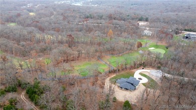 New construction located on fairway #3 of the prestigious Club on The Club At Porto Cima in Missouri - for sale on GolfHomes.com, golf home, golf lot
