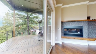 Elevated living in a place that feels like a getaway--welcome to on Bella Vista Country Club - Scottsdale in Arkansas - for sale on GolfHomes.com, golf home, golf lot