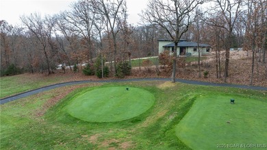 New construction located on fairway #3 of the prestigious Club on The Club At Porto Cima in Missouri - for sale on GolfHomes.com, golf home, golf lot