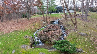 New construction located on fairway #3 of the prestigious Club on The Club At Porto Cima in Missouri - for sale on GolfHomes.com, golf home, golf lot