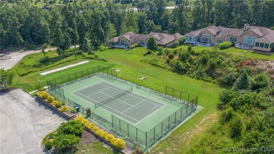 New construction located on fairway #3 of the prestigious Club on The Club At Porto Cima in Missouri - for sale on GolfHomes.com, golf home, golf lot
