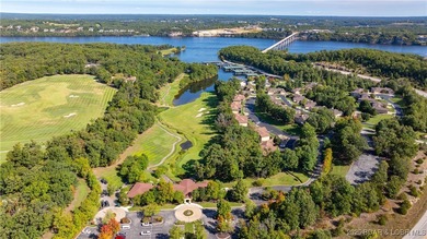 New construction located on fairway #3 of the prestigious Club on The Club At Porto Cima in Missouri - for sale on GolfHomes.com, golf home, golf lot