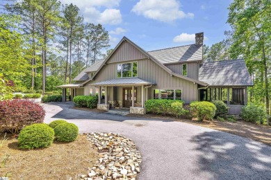 Located on a private cul-de-sac, this modern mountain/lake on The Reserve At Lake Keowee in South Carolina - for sale on GolfHomes.com, golf home, golf lot