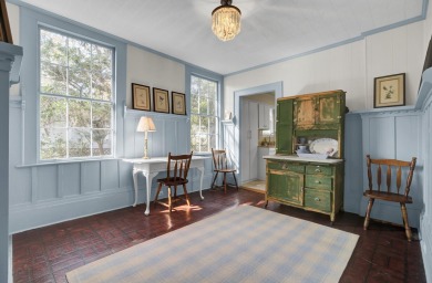 This charming and unique Dutch Colonial-style home is nestled in on Miler Country Club in South Carolina - for sale on GolfHomes.com, golf home, golf lot