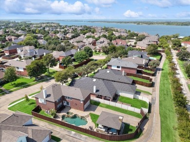 The Backyard of your Dreams awaits! Updated 4 Bed, 2.5 Bath home on Stewart Peninsula Golf Course in Texas - for sale on GolfHomes.com, golf home, golf lot