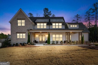 Welcome to this wonderfully modern farmhouse in the stunning on The Governors Towne Club in Georgia - for sale on GolfHomes.com, golf home, golf lot