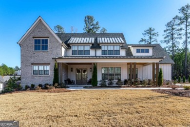 Welcome to this wonderfully modern farmhouse in the stunning on The Governors Towne Club in Georgia - for sale on GolfHomes.com, golf home, golf lot