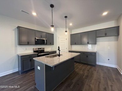 End-unit alert! Don't miss this stunning 1 car garage MOVE IN on Riverwood Golf and Athletic Club in North Carolina - for sale on GolfHomes.com, golf home, golf lot