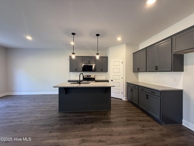 End-unit alert! Don't miss this stunning 1 car garage MOVE IN on Riverwood Golf and Athletic Club in North Carolina - for sale on GolfHomes.com, golf home, golf lot