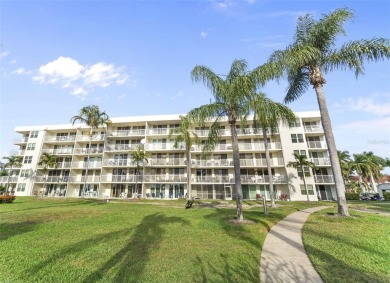Amazing opportunity to own a top floor condo with breathtaking on Isla Del Sol Yacht and Country Club in Florida - for sale on GolfHomes.com, golf home, golf lot