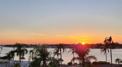 Amazing opportunity to own a top floor condo with breathtaking on Isla Del Sol Yacht and Country Club in Florida - for sale on GolfHomes.com, golf home, golf lot