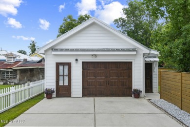 This gorgeous bungalow in Old Town Bay Saint Louis is Coastal on The Bridges Golf Club At Hollywood Casino in Mississippi - for sale on GolfHomes.com, golf home, golf lot