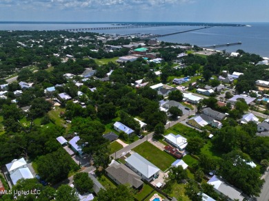 This gorgeous bungalow in Old Town Bay Saint Louis is Coastal on The Bridges Golf Club At Hollywood Casino in Mississippi - for sale on GolfHomes.com, golf home, golf lot