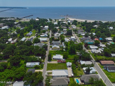 This gorgeous bungalow in Old Town Bay Saint Louis is Coastal on The Bridges Golf Club At Hollywood Casino in Mississippi - for sale on GolfHomes.com, golf home, golf lot