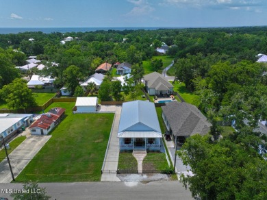 This gorgeous bungalow in Old Town Bay Saint Louis is Coastal on The Bridges Golf Club At Hollywood Casino in Mississippi - for sale on GolfHomes.com, golf home, golf lot