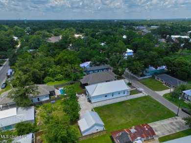 This gorgeous bungalow in Old Town Bay Saint Louis is Coastal on The Bridges Golf Club At Hollywood Casino in Mississippi - for sale on GolfHomes.com, golf home, golf lot