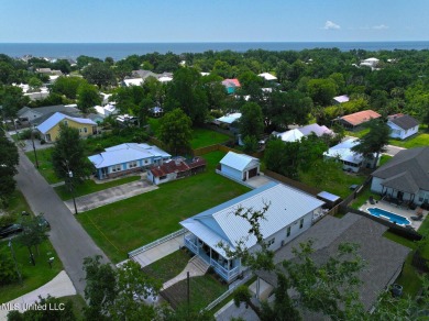 This gorgeous bungalow in Old Town Bay Saint Louis is Coastal on The Bridges Golf Club At Hollywood Casino in Mississippi - for sale on GolfHomes.com, golf home, golf lot