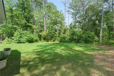 This lovely custom-built home offers a flowing, spacious on Fairfield Plantation Golf and Country Club in Georgia - for sale on GolfHomes.com, golf home, golf lot