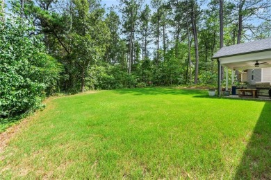 This lovely custom-built home offers a flowing, spacious on Fairfield Plantation Golf and Country Club in Georgia - for sale on GolfHomes.com, golf home, golf lot