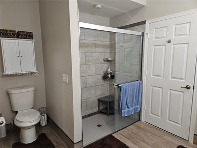 Lovely 3BR/2BA/2CG villa in the gated community of Summerfield on Champions Club at Summerfield in Florida - for sale on GolfHomes.com, golf home, golf lot