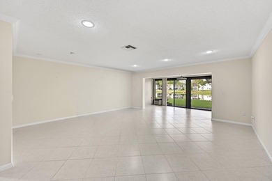 Welcome to this light and bright 2BR/2.5BA lakefront townhouse on Boca Lago Golf and Country Club in Florida - for sale on GolfHomes.com, golf home, golf lot