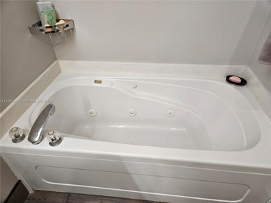 Lovely 3BR/2BA/2CG villa in the gated community of Summerfield on Champions Club at Summerfield in Florida - for sale on GolfHomes.com, golf home, golf lot