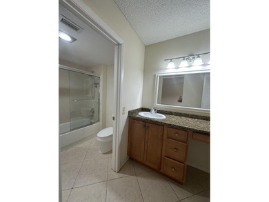 Welcome to this light and bright 2BR/2.5BA lakefront townhouse on Boca Lago Golf and Country Club in Florida - for sale on GolfHomes.com, golf home, golf lot