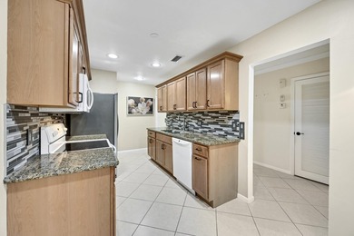 Welcome to this light and bright 2BR/2.5BA lakefront townhouse on Boca Lago Golf and Country Club in Florida - for sale on GolfHomes.com, golf home, golf lot