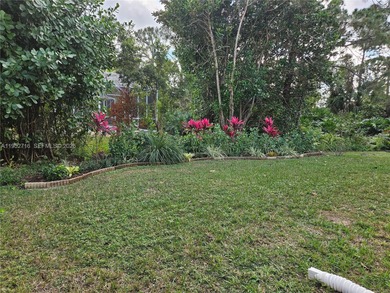 Lovely 3BR/2BA/2CG villa in the gated community of Summerfield on Champions Club at Summerfield in Florida - for sale on GolfHomes.com, golf home, golf lot