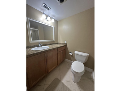 Welcome to this light and bright 2BR/2.5BA lakefront townhouse on Boca Lago Golf and Country Club in Florida - for sale on GolfHomes.com, golf home, golf lot