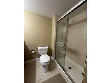 Welcome to this light and bright 2BR/2.5BA lakefront townhouse on Boca Lago Golf and Country Club in Florida - for sale on GolfHomes.com, golf home, golf lot