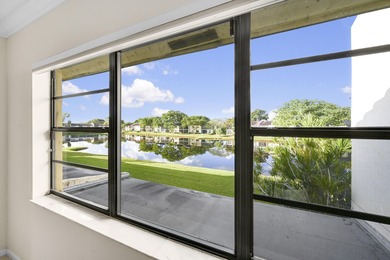 Welcome to this light and bright 2BR/2.5BA lakefront townhouse on Boca Lago Golf and Country Club in Florida - for sale on GolfHomes.com, golf home, golf lot